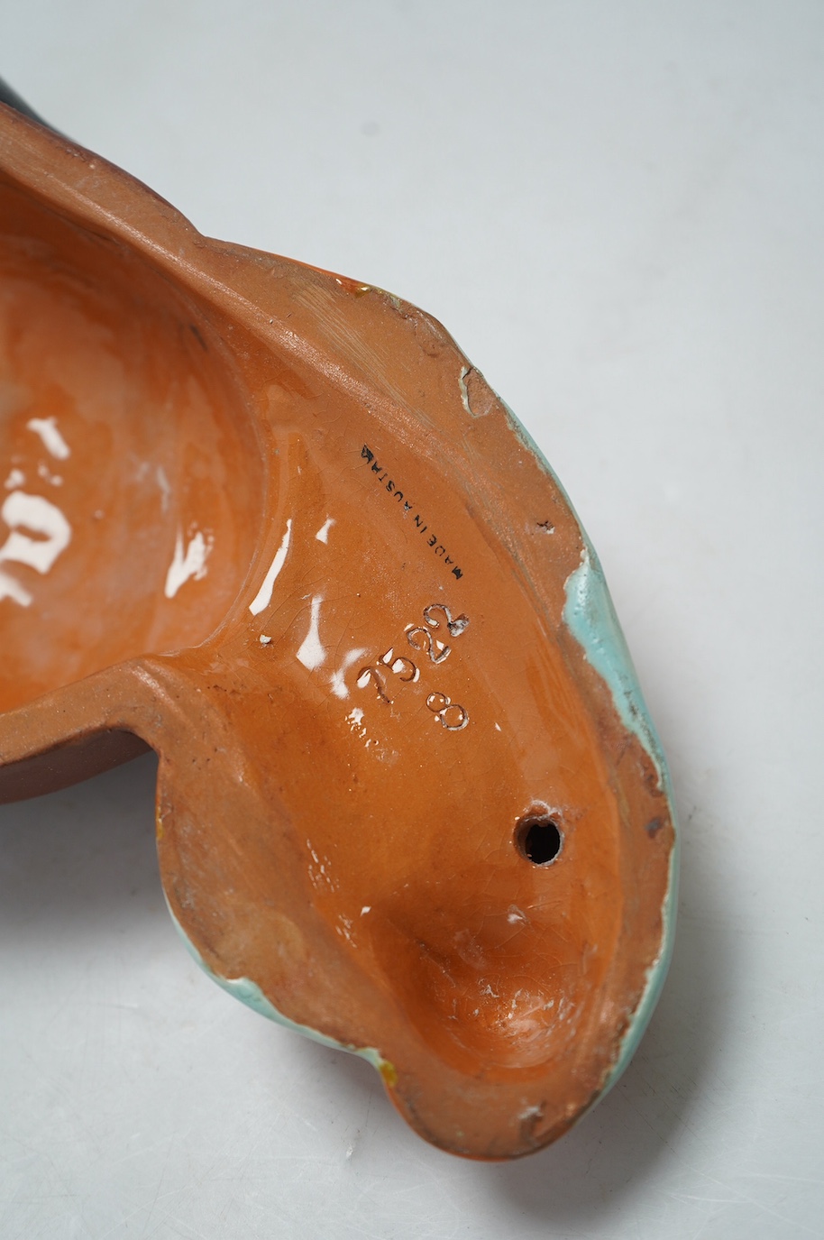 A Goldscheider terracotta wall mask, 29cm. Condition - fair to good